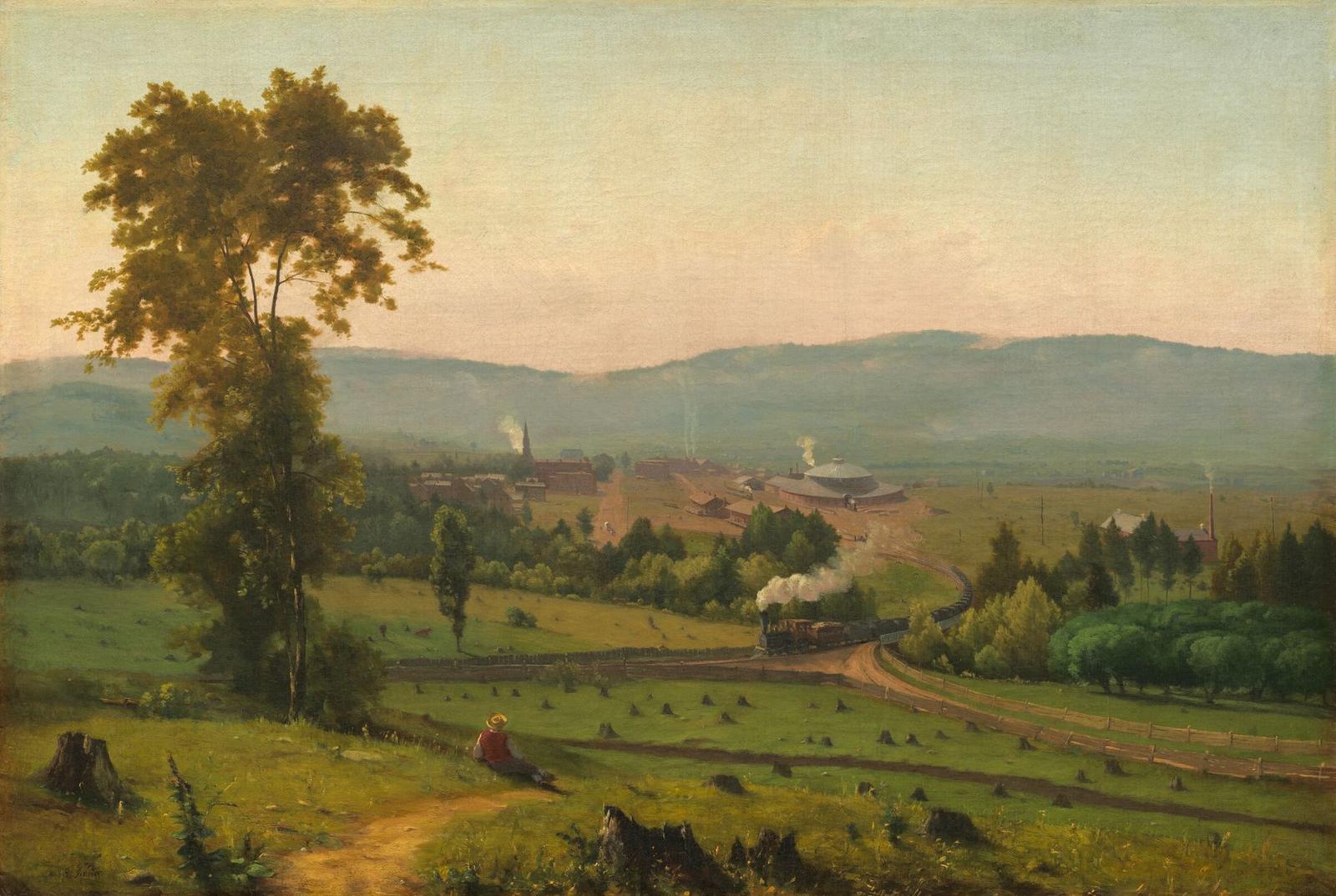 A painting of a broad green valley with low blue hills; a steam train trails white smoke along a curving track towards a roundhouse and a small town, while in the foreground a man reclines on a hillside dotted with tree stumps.